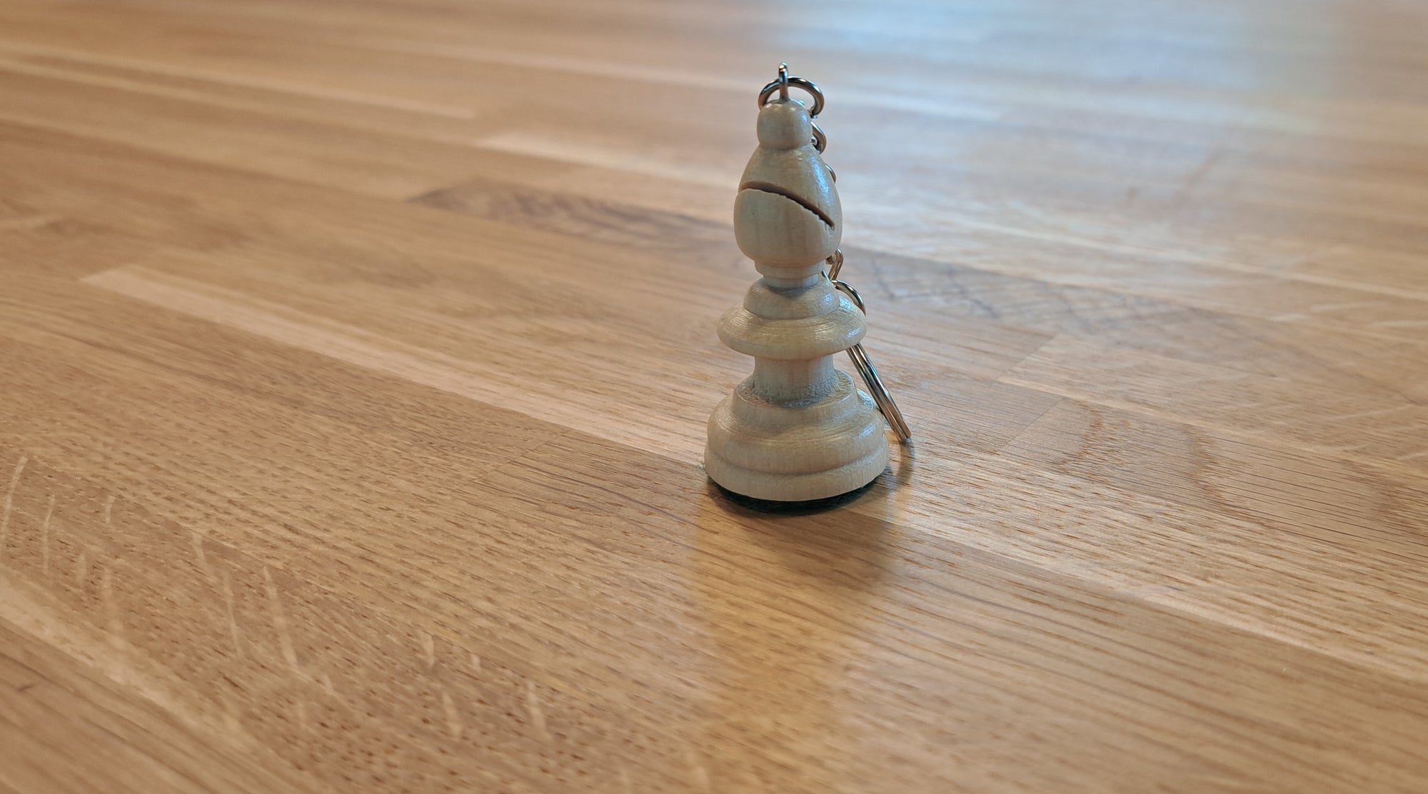 Schlüsselanhänger Weißer Läufer