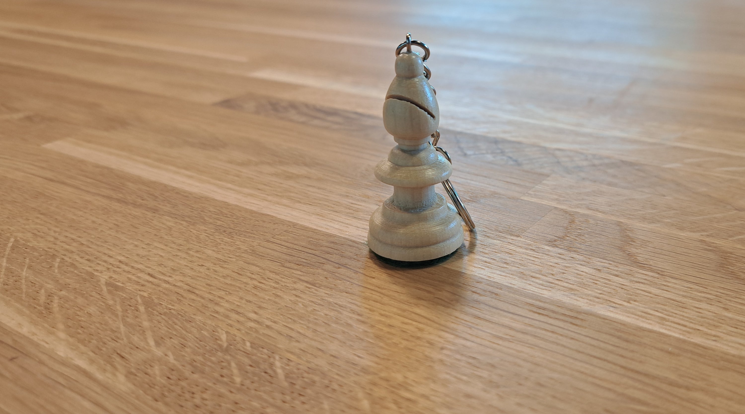 Schlüsselanhänger Weißer Läufer